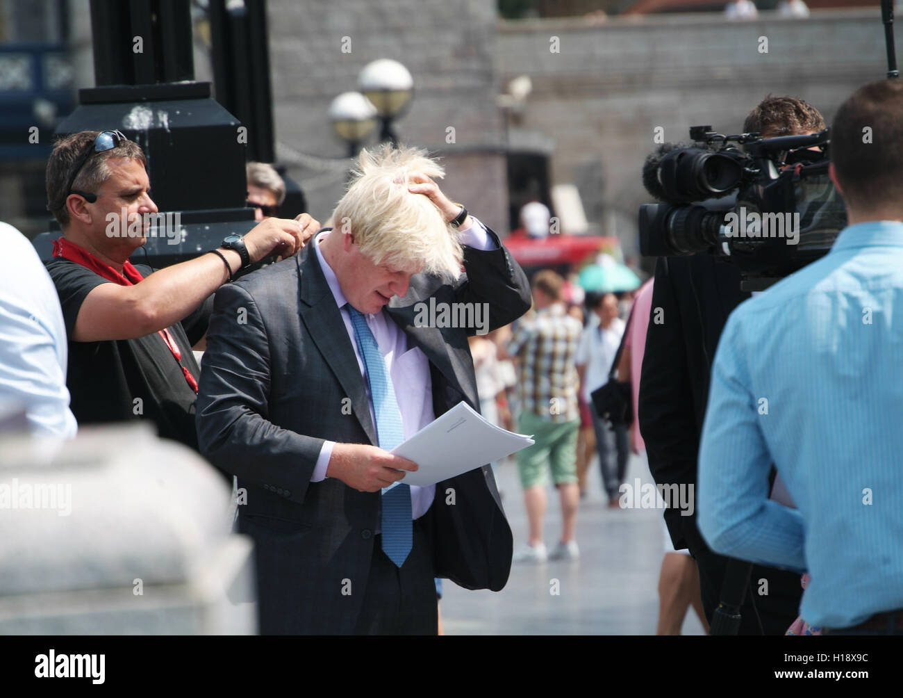 LONDON, UK - JULY 17TH 2013: London mayor Boris Johnson preparing to give an interview outside the City Hall in London, UK, on J Stock Photo