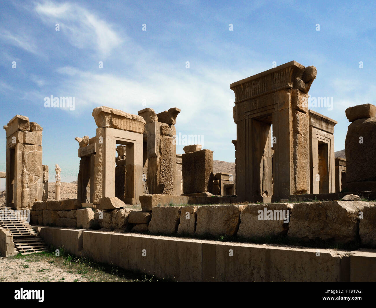 Tachara ruins at Persepolis in Iran with blue sky and clouds Stock Photo