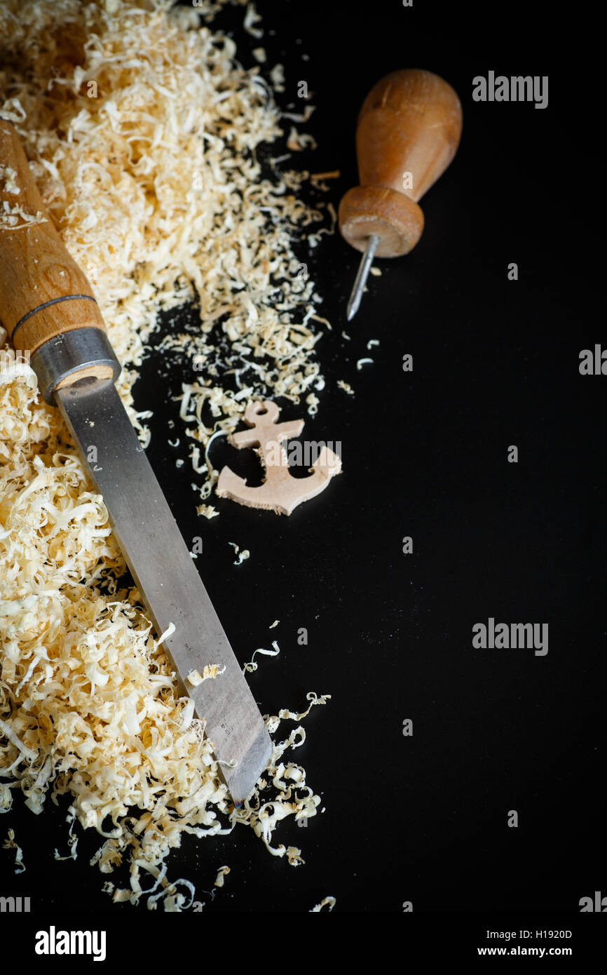 Woodworking tools. Chisel with sawdust . Stock Photo