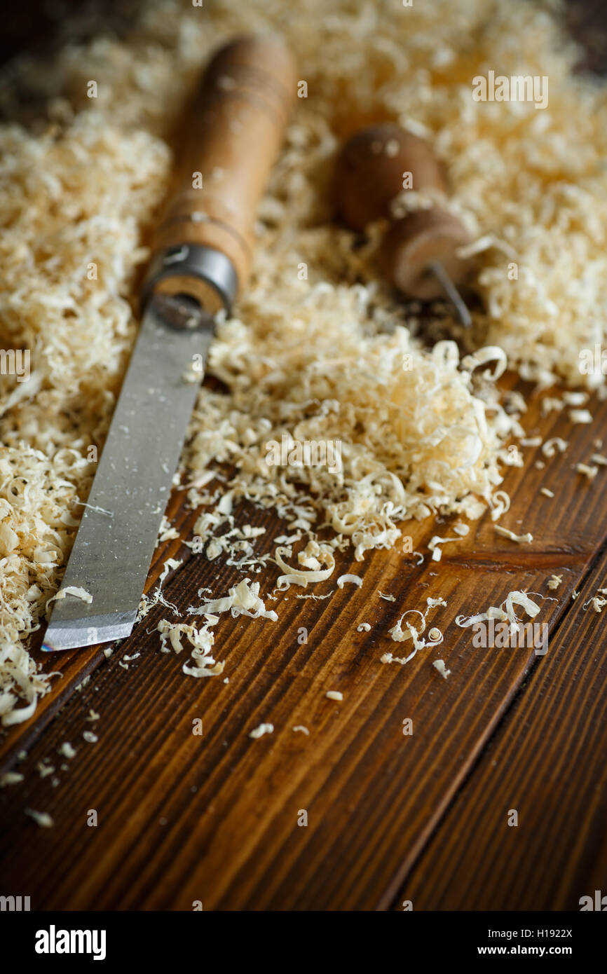 Woodworking tools. Chisel with sawdust . Stock Photo