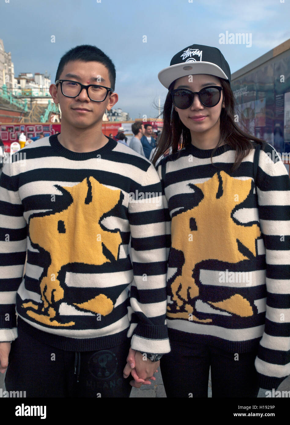 Boyfriend and girlfriend in matching jumpers in Brighton Stock Photo