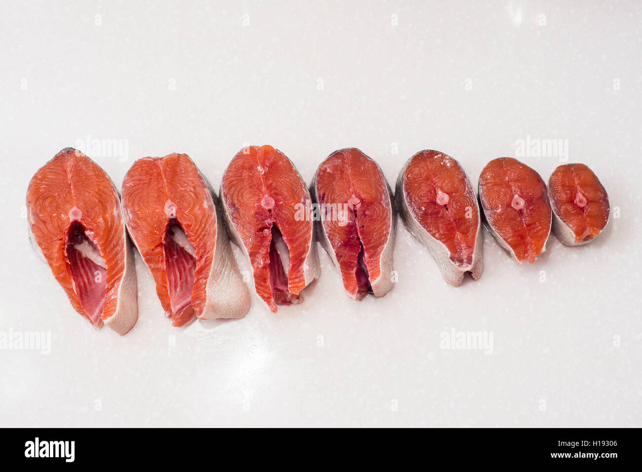 raw salmon fillet isolated on white background Stock Photo - Alamy