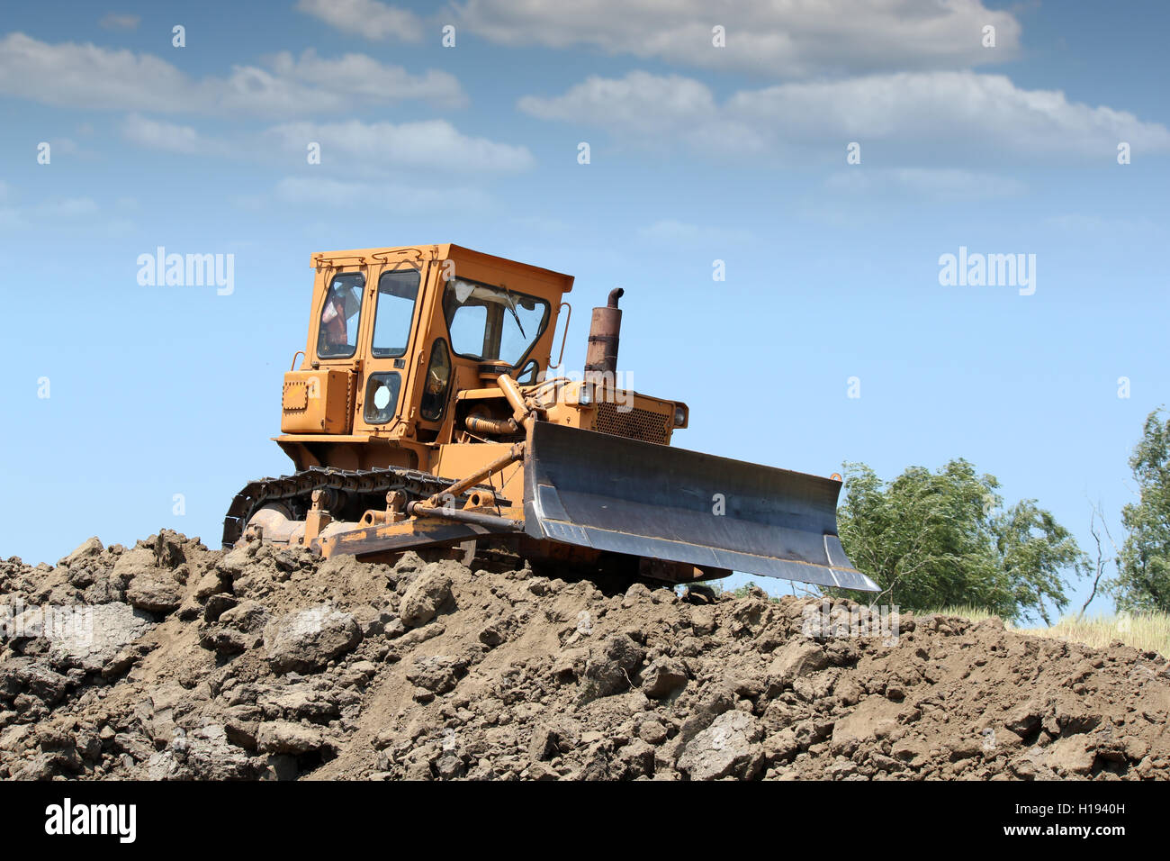 bulldozer working on road construction Stock Photo