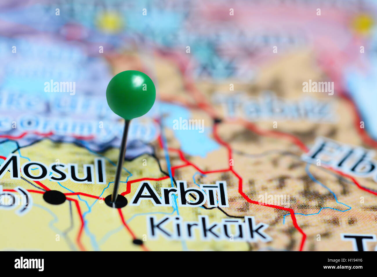 Arbil pinned on a map of Iraq Stock Photo