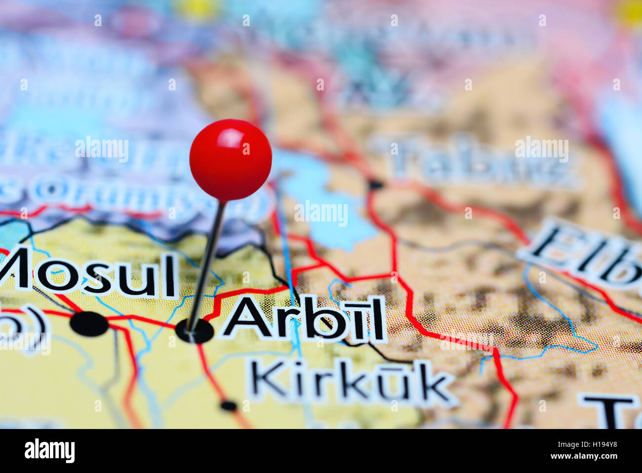 Arbil pinned on a map of Iraq Stock Photo