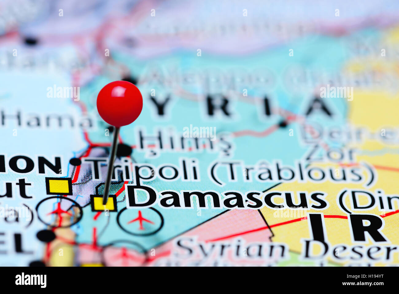 Damascus pinned on a map of Syria Stock Photo