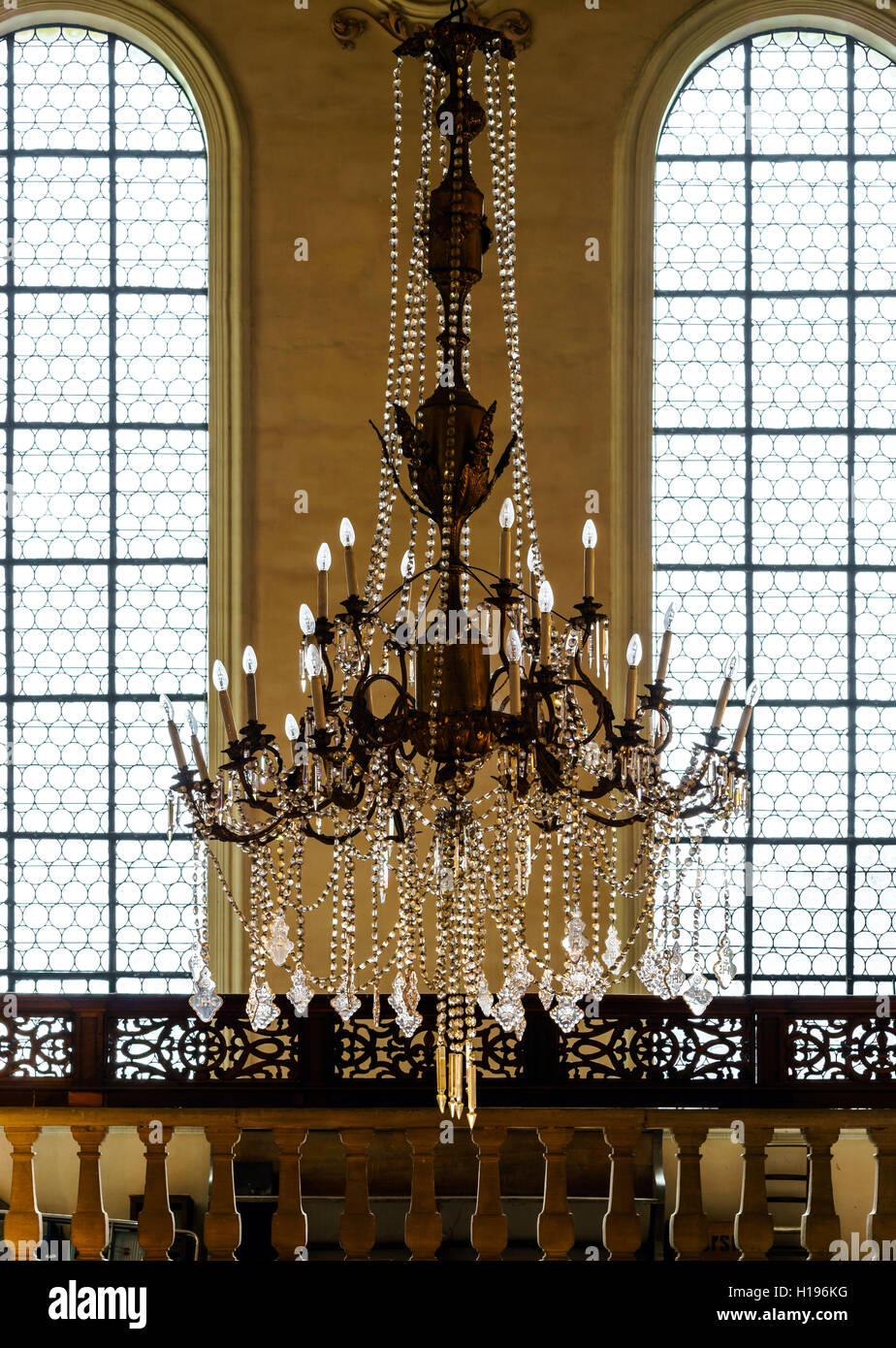 Crystal chandelier lighting in the big majestic hall, old-style Stock Photo  - Alamy