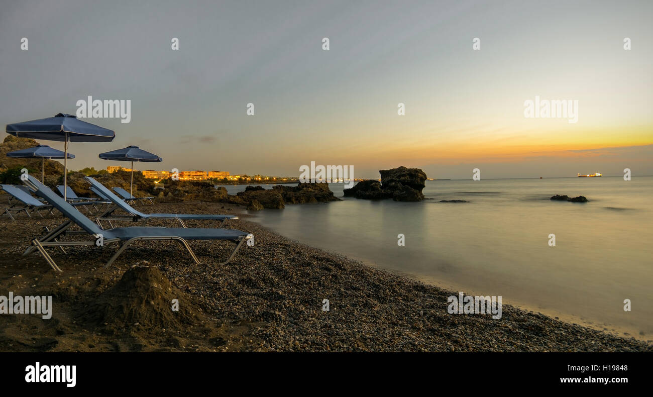 A beautiful sunrise on the Greek coast of Rhodes in kalithia Stock Photo