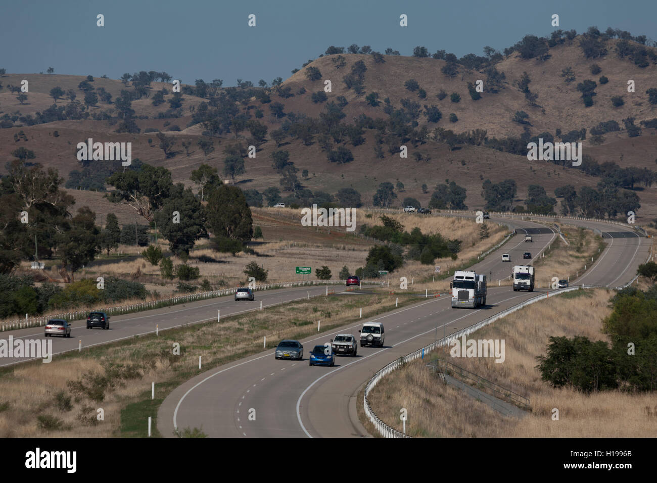 Trucks using the Hume Highway a major transportation link between Sydney and Melbourne Australia Stock Photo