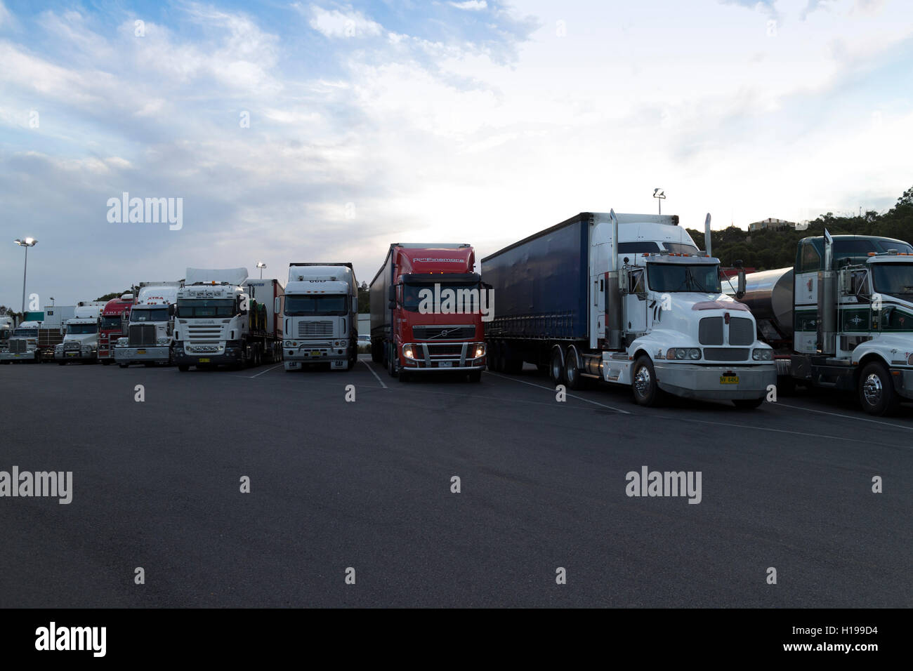 Interstate long-distance trucks at service station parking lot Hume Highway Victoria Australia Stock Photo