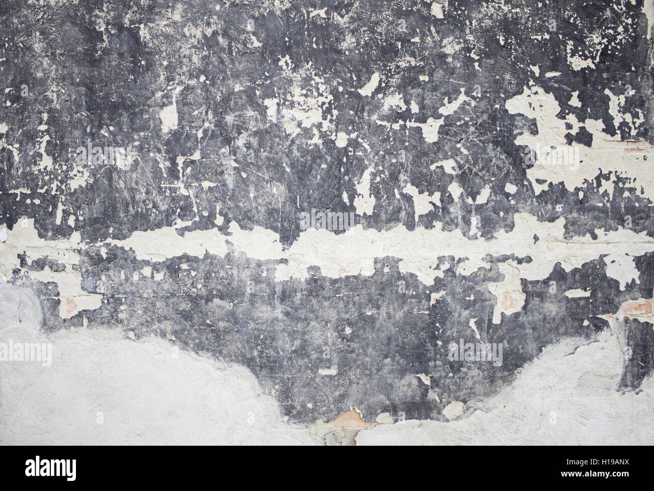 Wall blackened broken in urban street Stock Photo Alamy