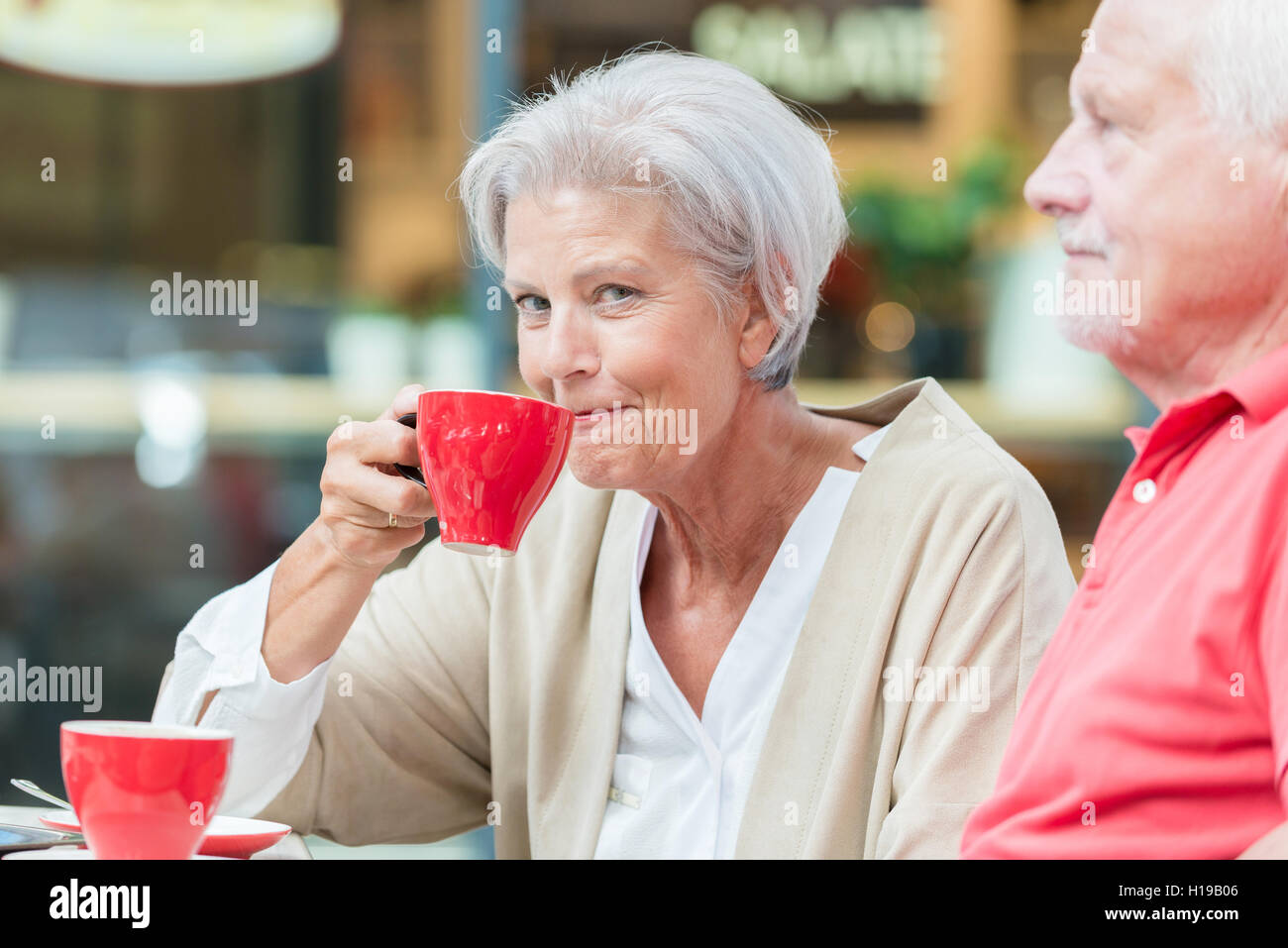 Elderly couple drinking coffee cafe hires stock photography and images