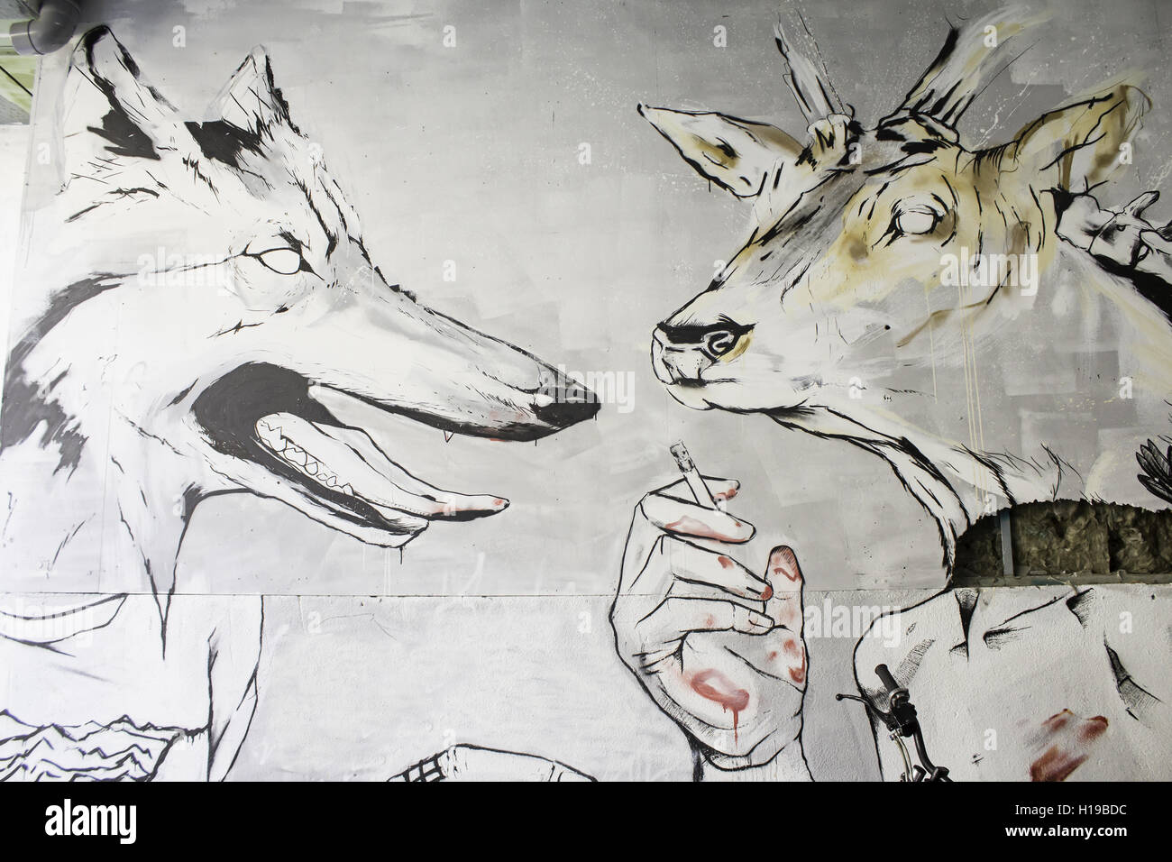 Wolf and elk urban wall painted, animals Stock Photo