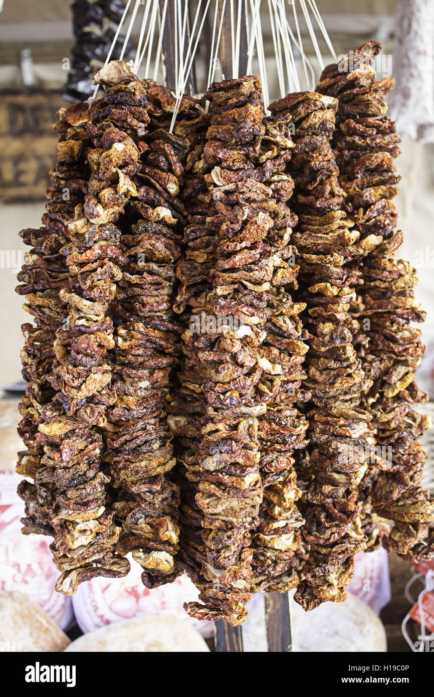 Dried peaches hanging on nutrition market Stock Photo Alamy