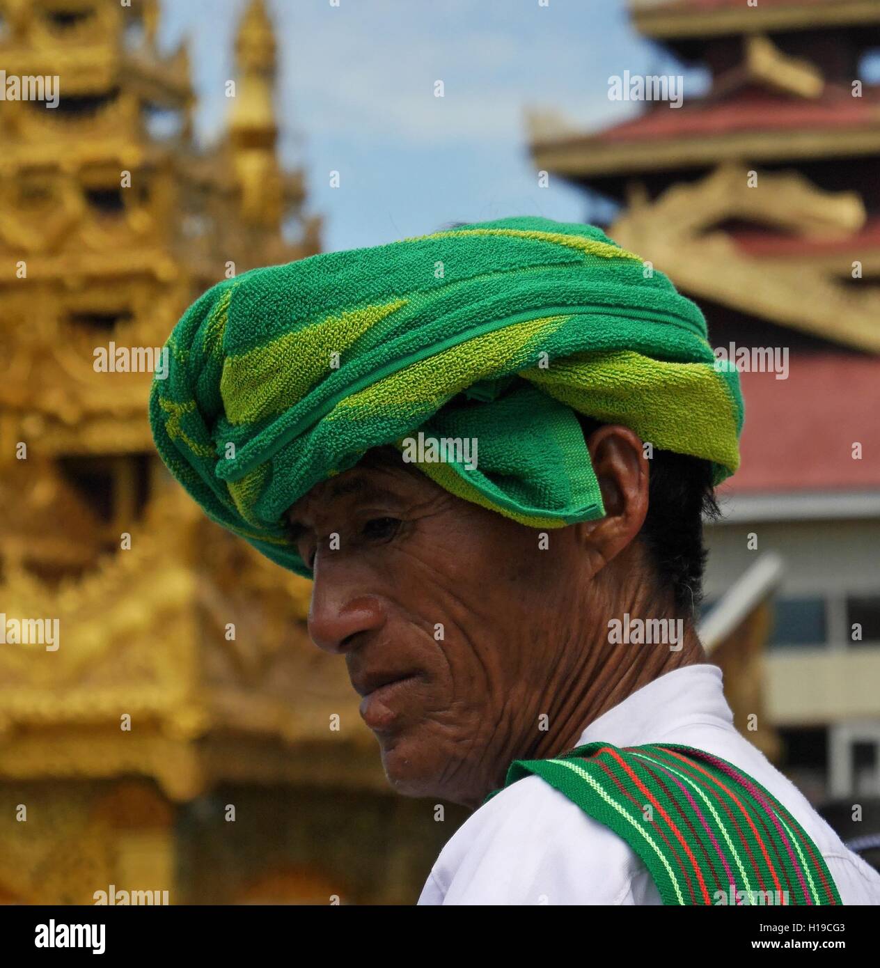 Close-up of Pa-O man wearing typical headdress of that ethnic group at Phaung Daw Oo Pagoda Festival, Inle Lake, Shan State, Myanmar (Burma) Stock Photo