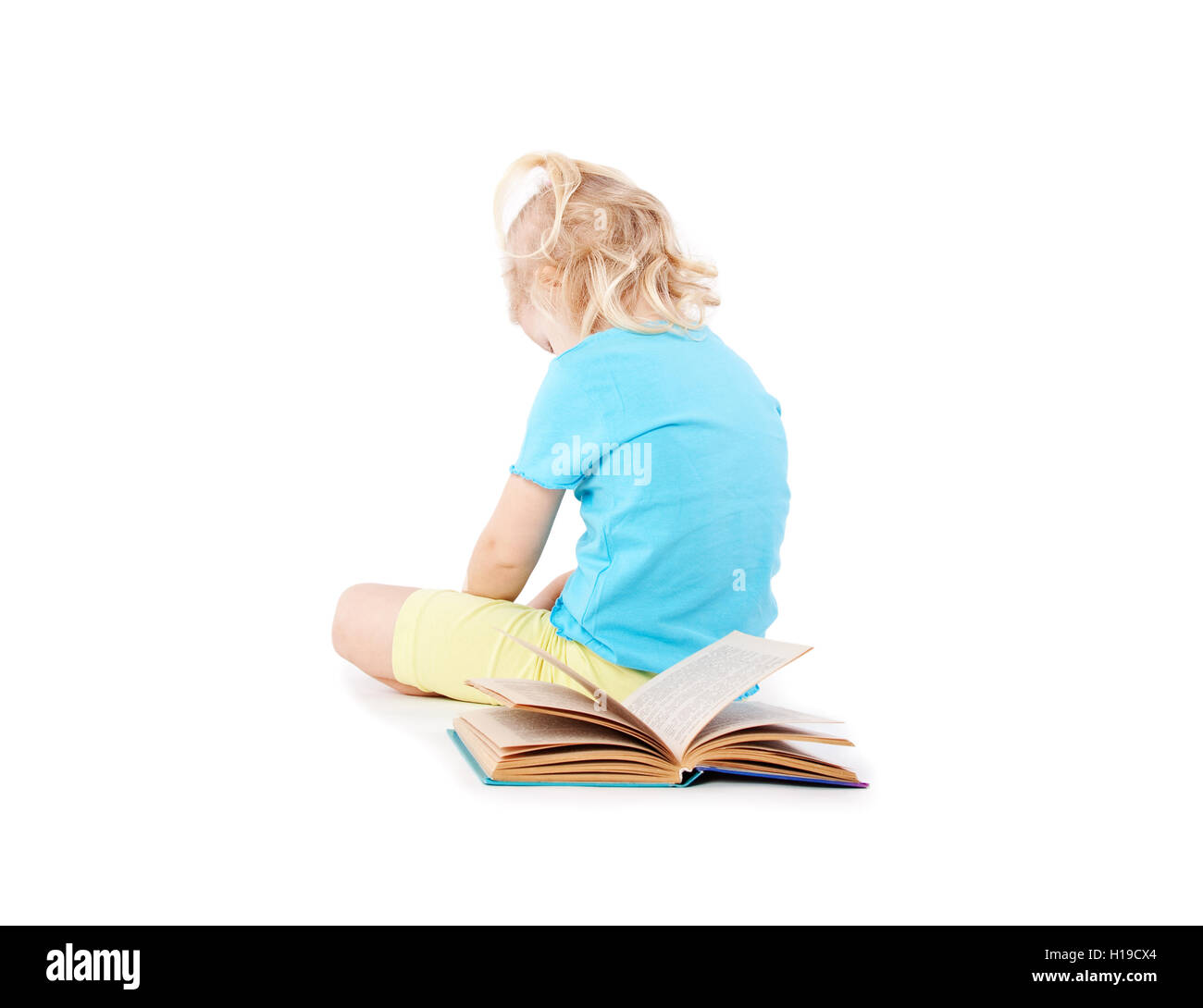 young girl refuse to read the book Stock Photo