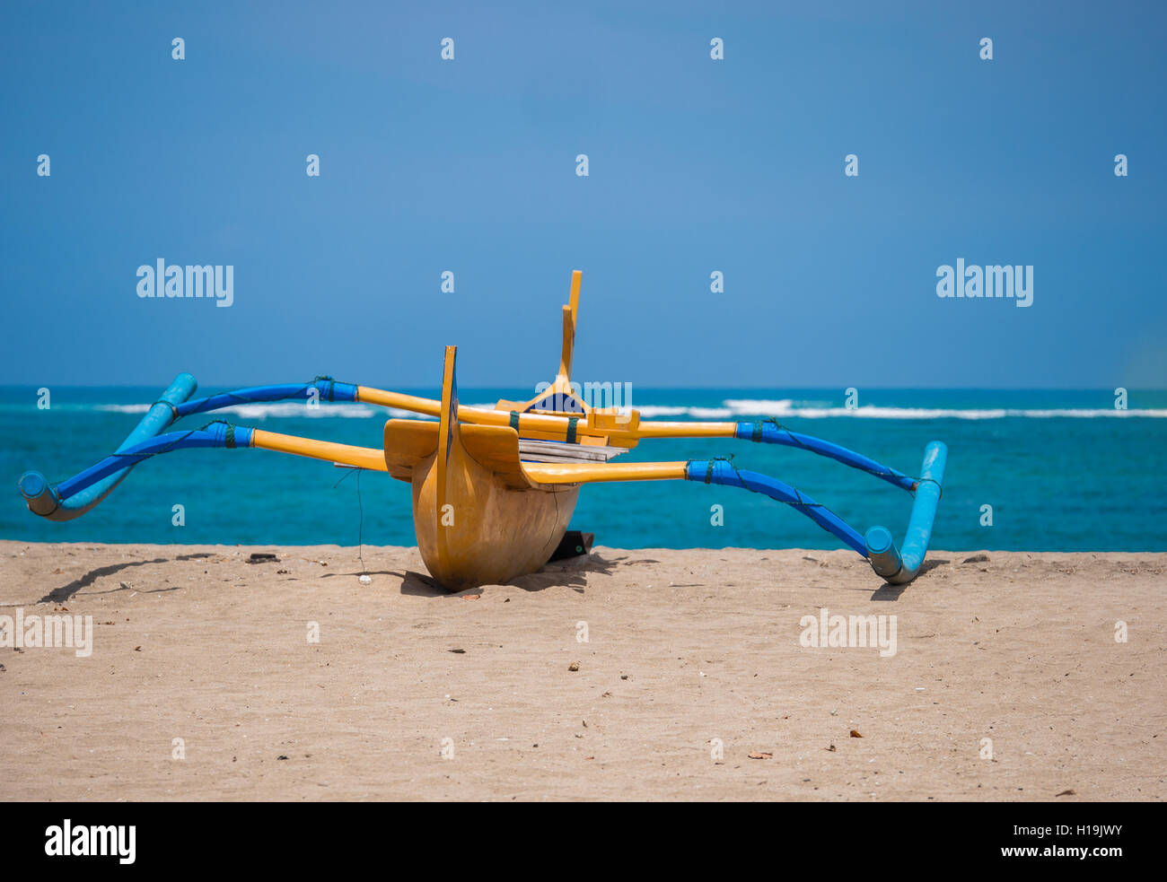 Traditional balinese "dragonfly" boat on the beach in Kuta Stock Photo