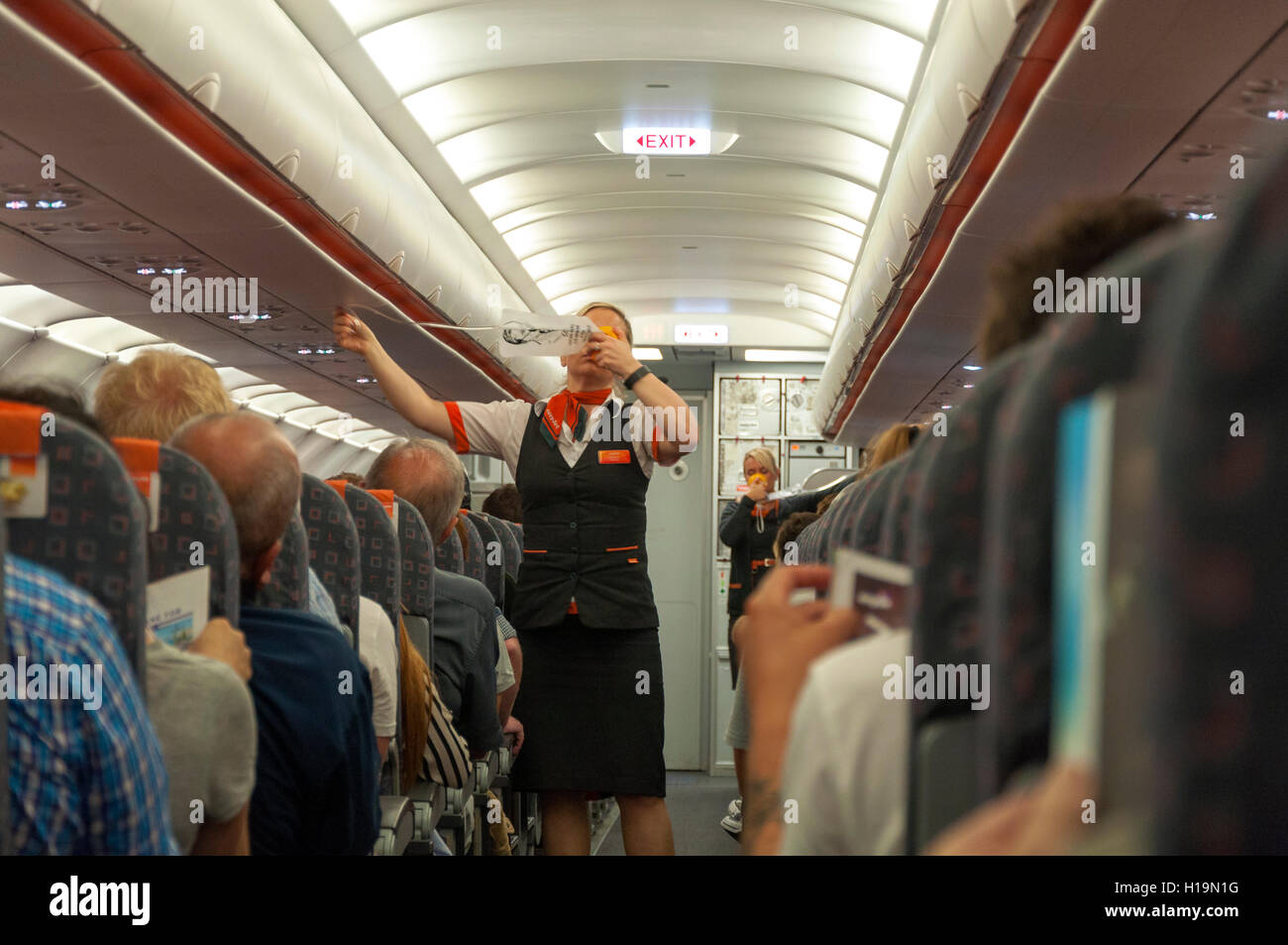 Easyjet flight safety demonstration Stock Photo Alamy
