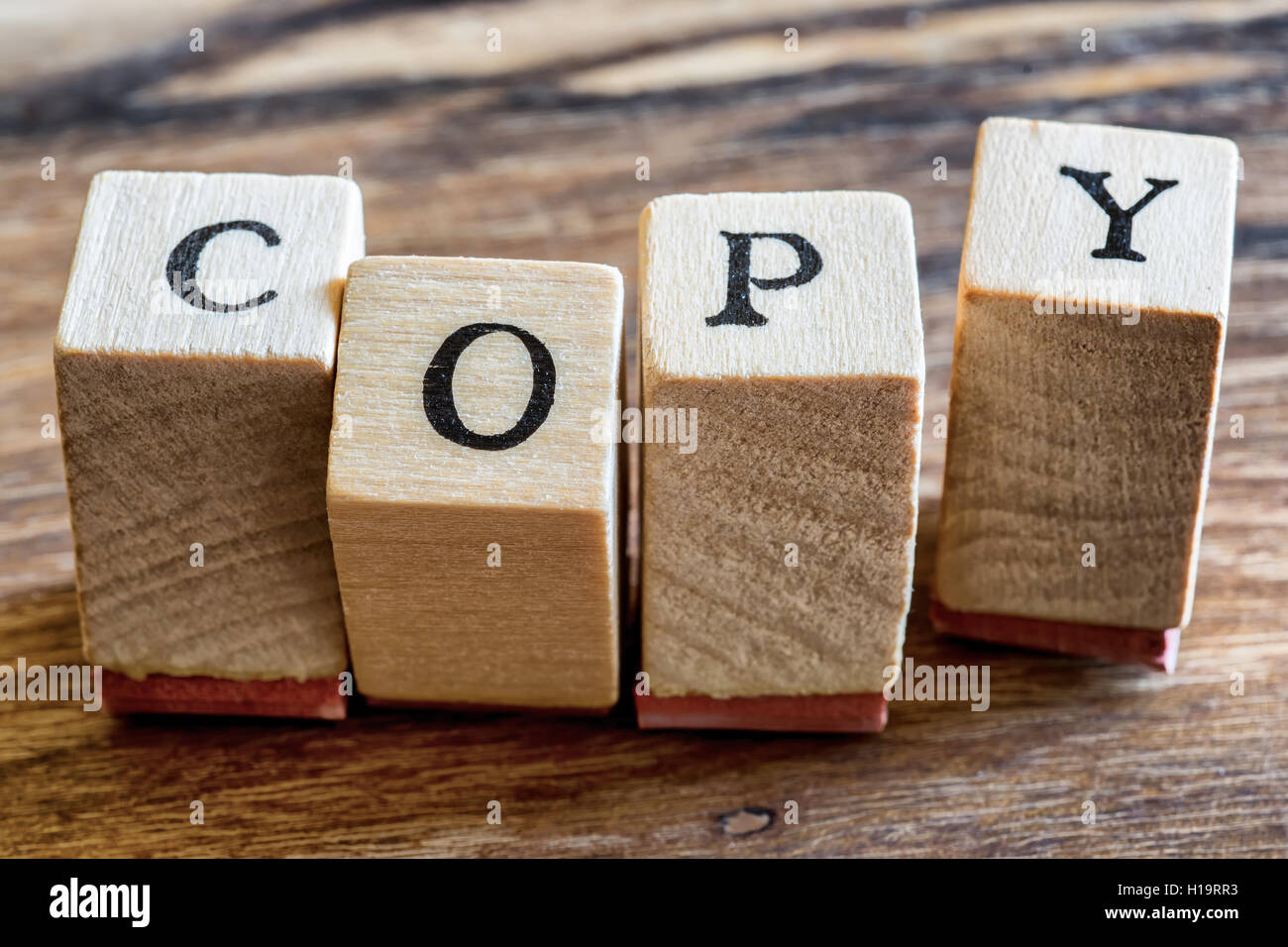 Copy Stamp on Woden Background. Copy Word Written in Wood Blocks Stock