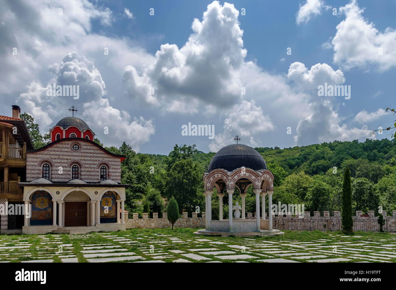 View of inner  part yard with new monastic house, alcove  and new church, in restored Montenegrin or Giginski monastery Stock Photo