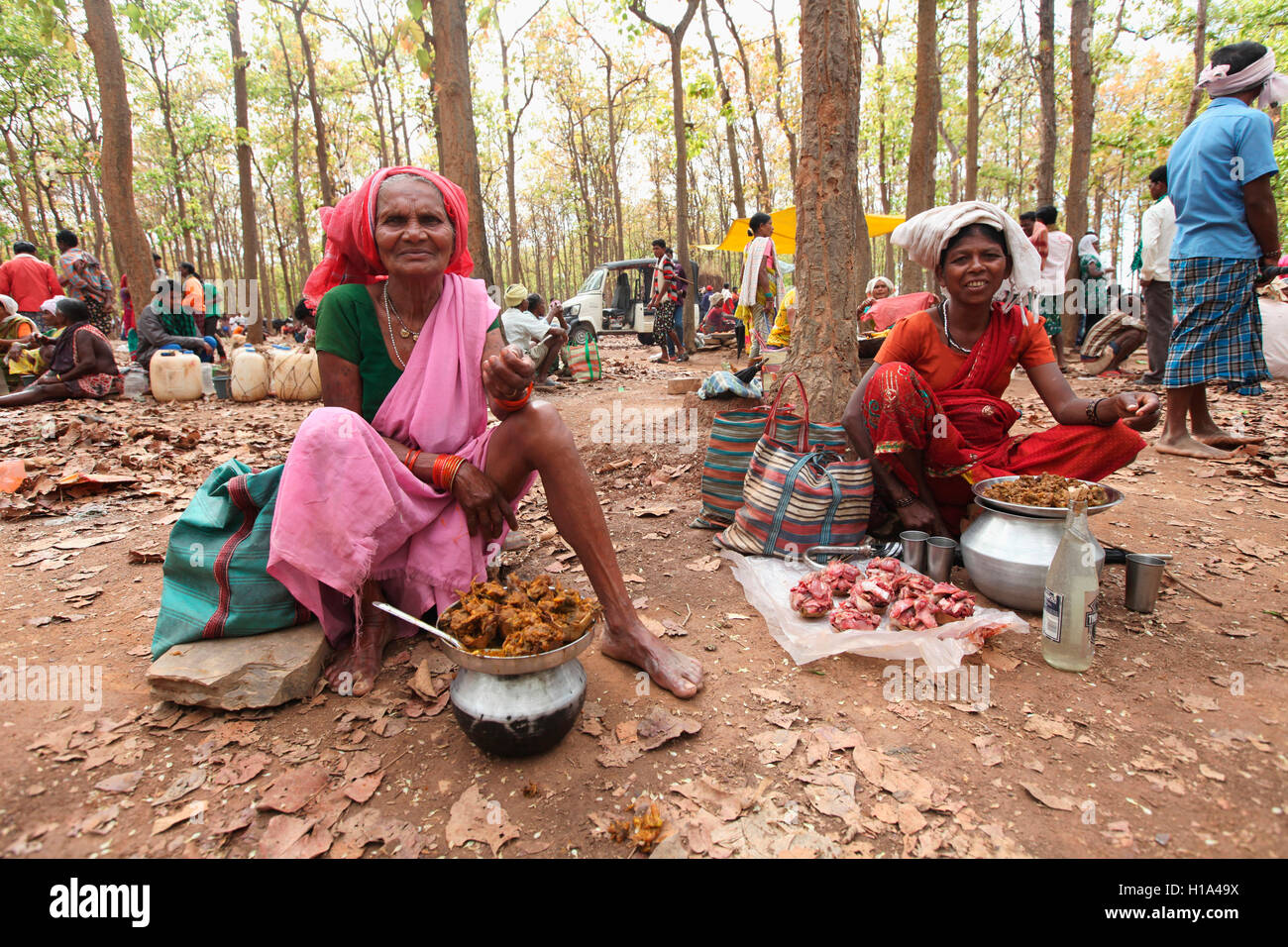 Women selling Dry Chicken and Mutton, Dhurwa Tribal Market, Pandripani Village, Chattisgarh, India Stock Photo