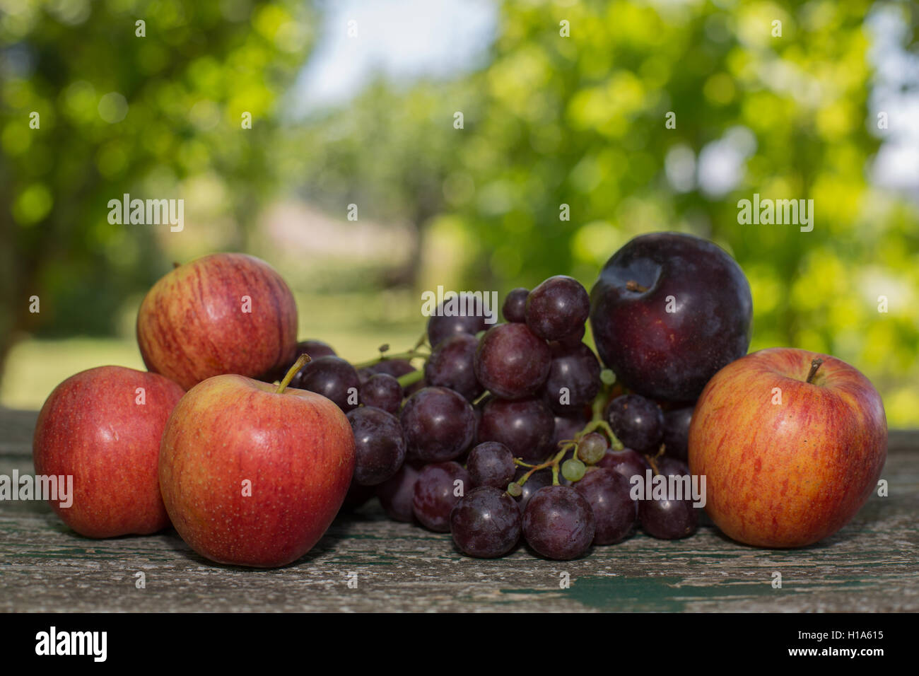 fruits in wooden table, outdoor Stock Photo - Alamy