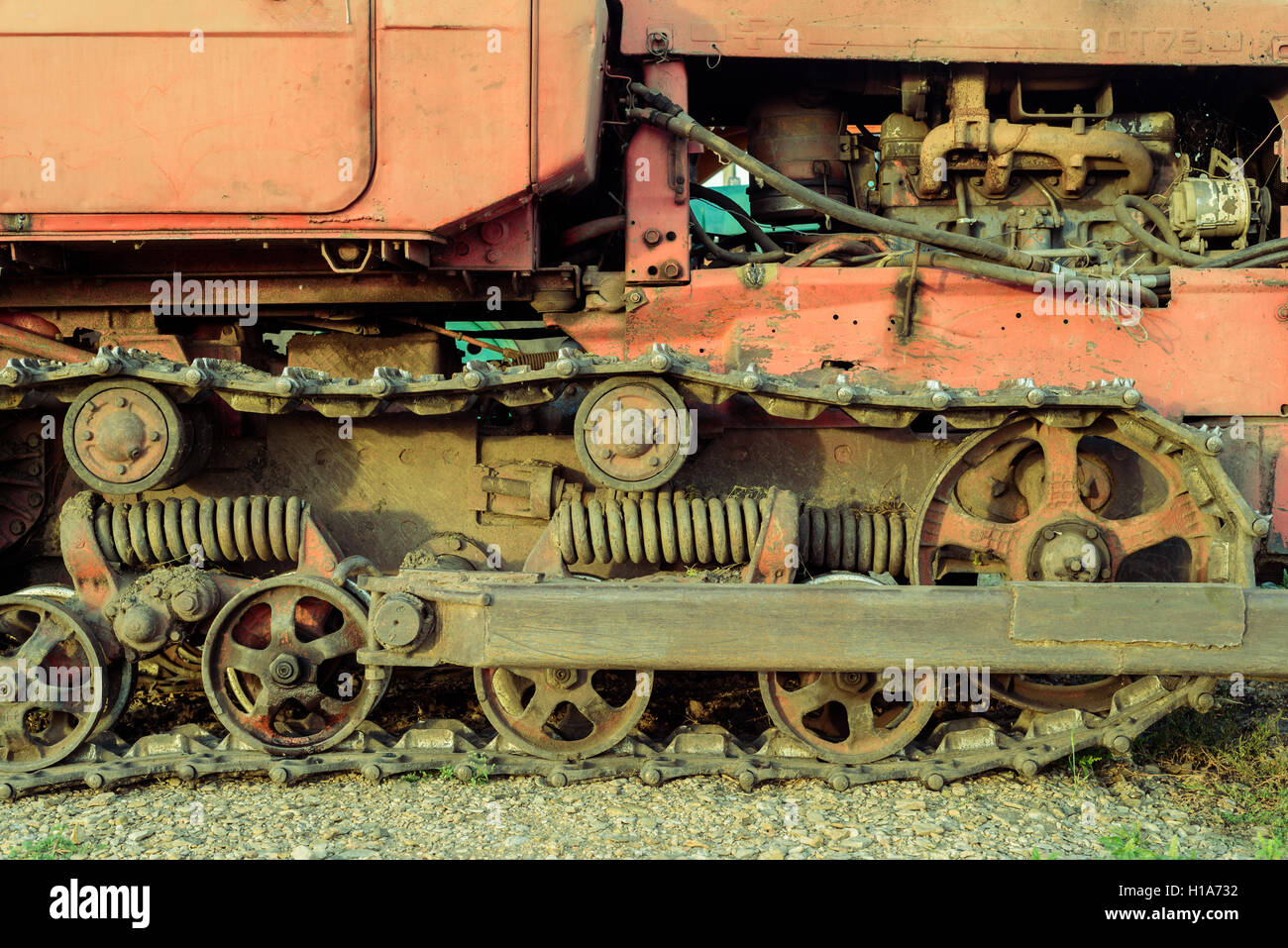 Old mechanical vehicle track with cogs and caterpillar style tracking Stock Photo