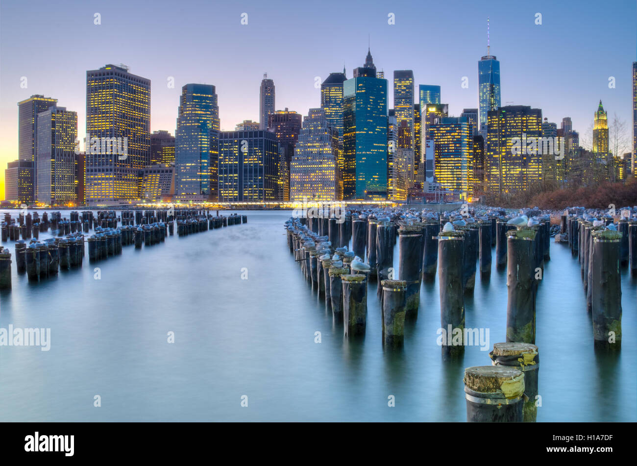 View of Manhattan Skyline at sunset across the East River from Brooklyn ...