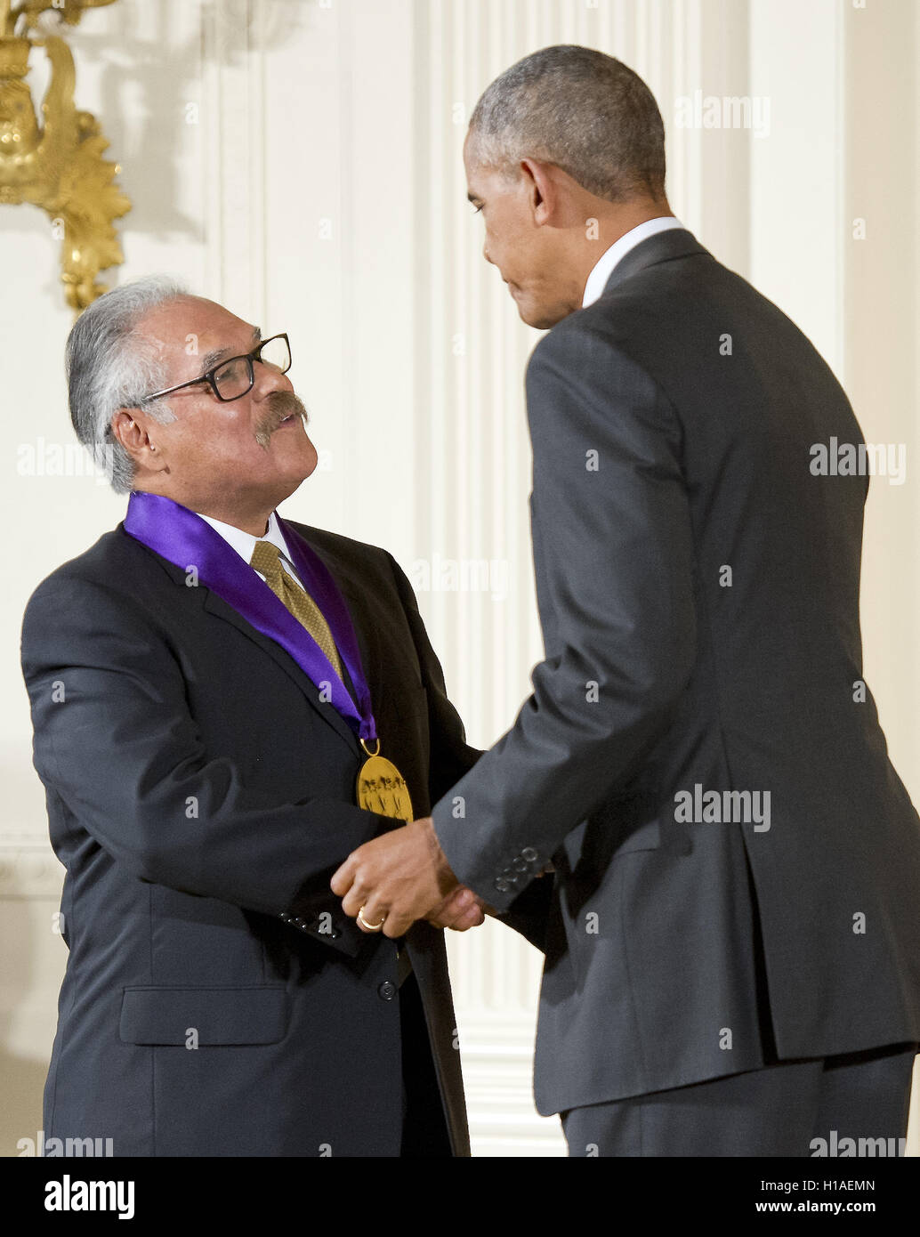 Washington, District of Columbia, USA. 22nd Sep, 2016. United States President Barack Obama presents the 2015 National Medal of Arts to Luis Valdez, Playwright, Actor, Writer, & Director of San Juan Bautista, California, during a ceremony in the East Room of the White House in Washington, DC on Thursday, September 22, 2016.Credit: Ron Sachs/CNP Credit:  Ron Sachs/CNP/ZUMA Wire/Alamy Live News Stock Photo