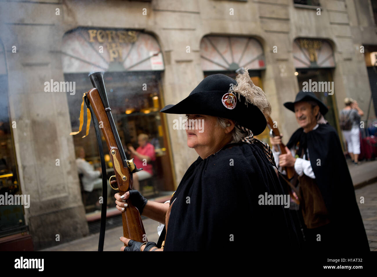Barcelona, Catalonia, Spain. 24th Sep, 2016. Trabucaires through the streets of Barcelona early in the morning on the occasion of the celebrations of the Merce Festival (Festes de la Merce). The Galejada Trabucaire marks the beginning of the day of the patron saint of Barcelona, La Merce. Men and women dressed as ancient Catalan bandits take to the streets of the old part of Barcelona and cause a loud noise with his blunderbusses full of gunpowder. © Jordi Boixareu/ZUMA Wire/Alamy Live News Stock Photo
