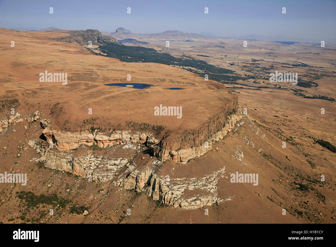 Aerial photograph of Platberg mountain with lakes on top and the Freestate landscape in the background Stock Photo