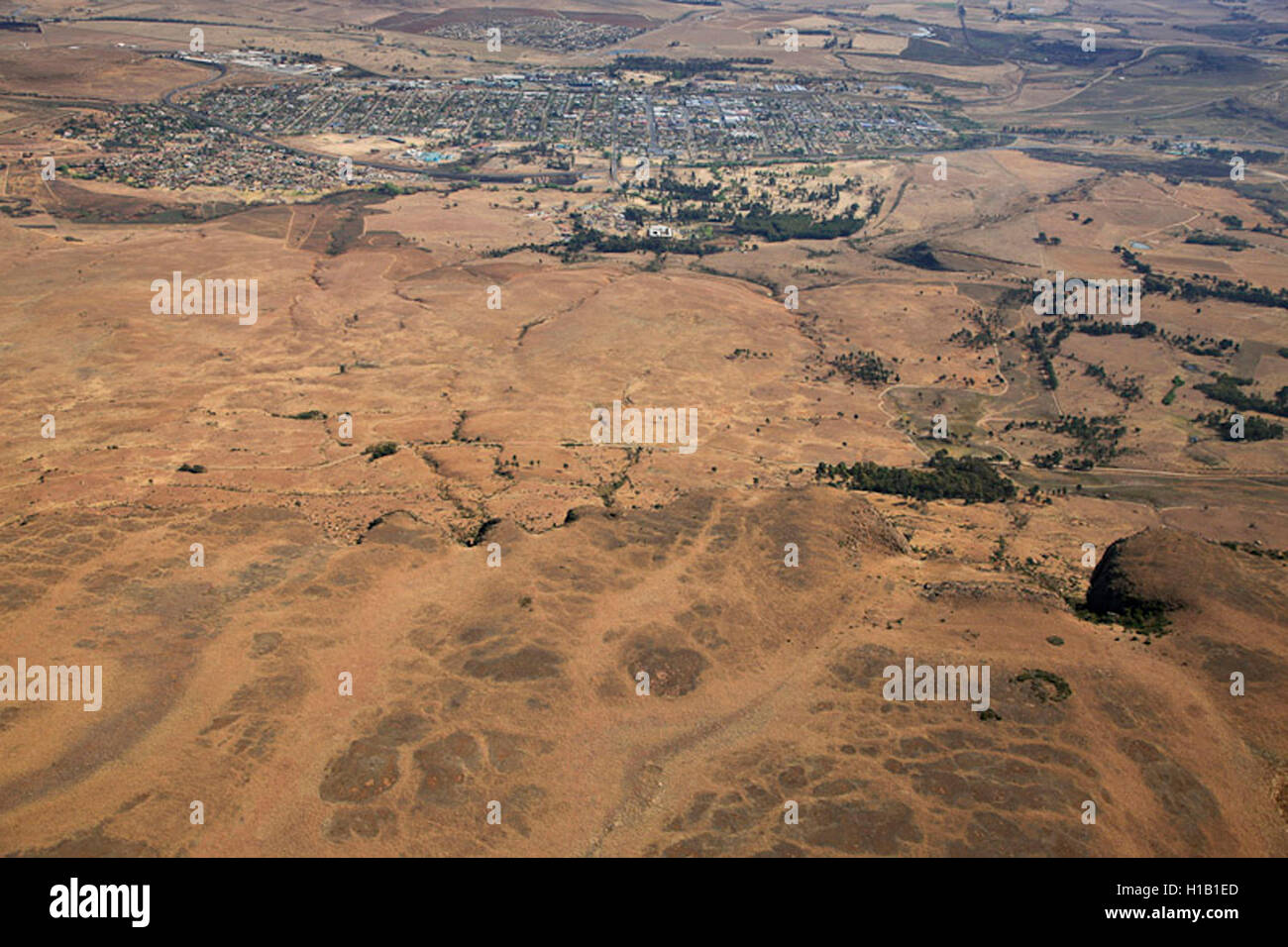 Aerial photograph of the foot of the Platberg mountain and the city of Harrismith in the background, Freestate, South Africa Stock Photo