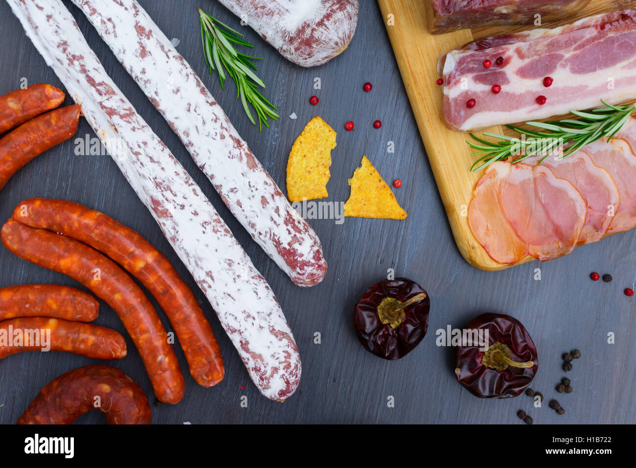 Picnic table with spanish sausage tapas Stock Photo Alamy