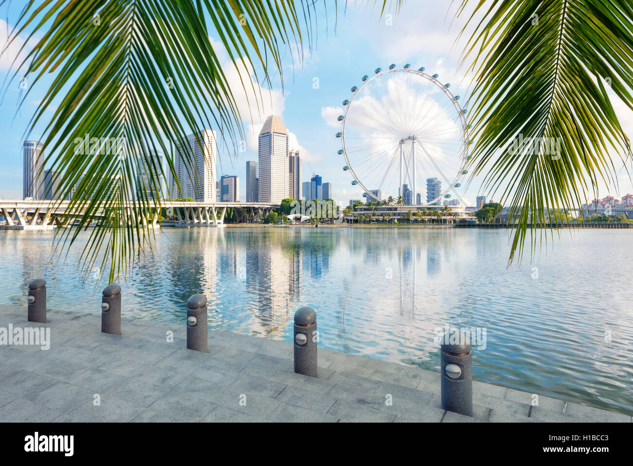 Singapore Bay from gardens side with palmtree on foreground Stock Photo