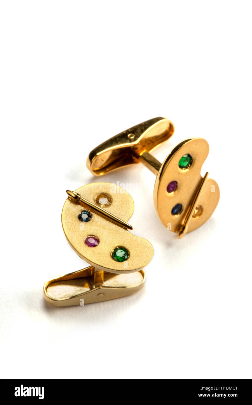 18ct Gold and multi gem set artist's palette cufflinks. Stock Photo