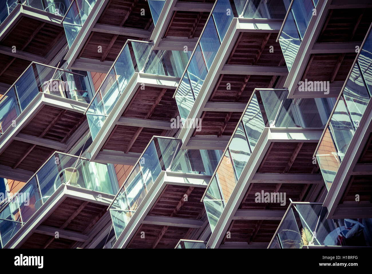 abstract photo of balconies on a block of flats forming a pattern Stock Photo