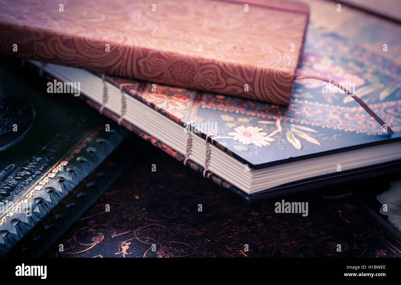 a pile of various beautiful journals and diaries Stock Photo Alamy