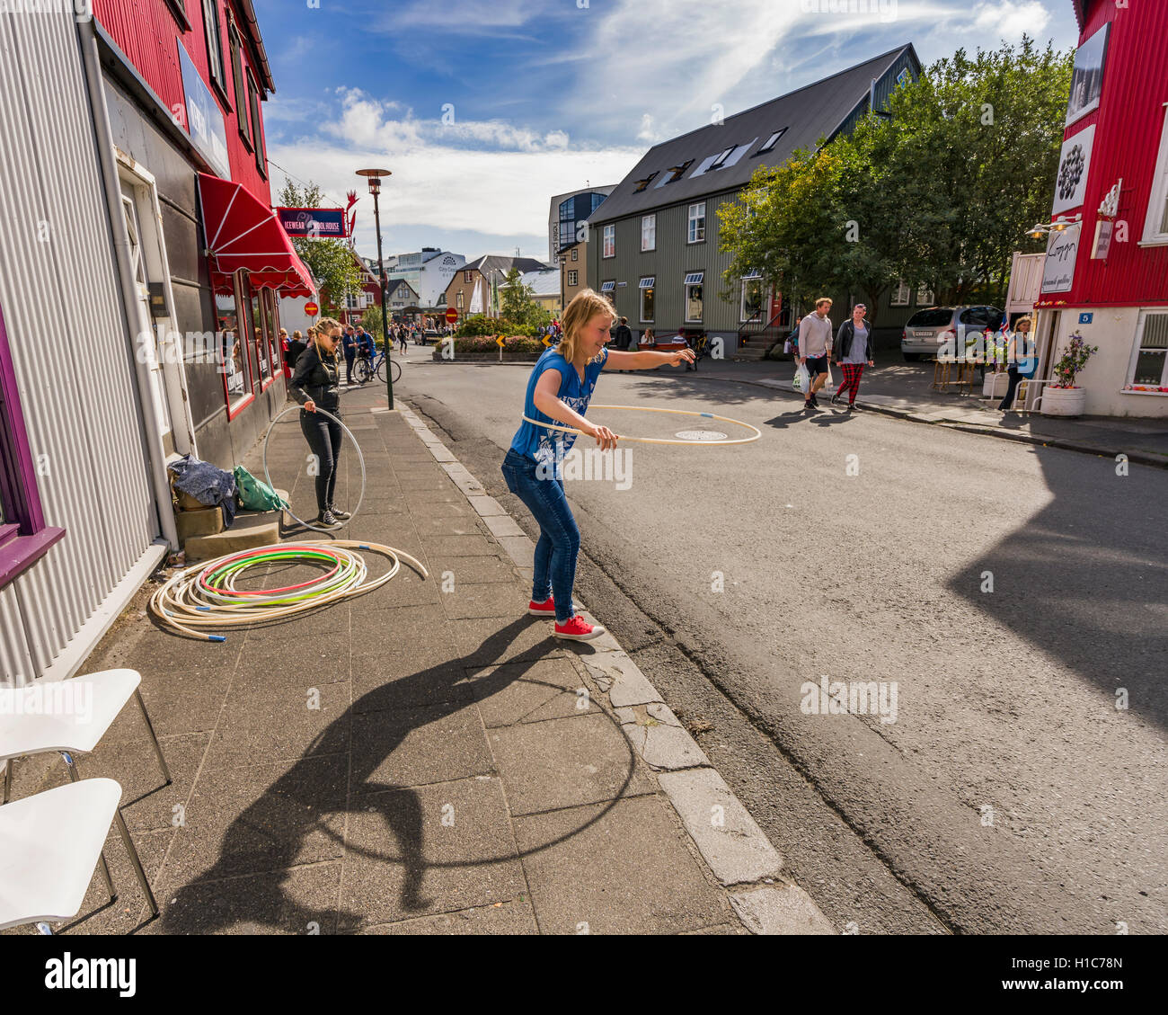 Girl using a hula hoop, Menningarnott-Cultural Festival in Reykjavik, Iceland Stock Photo