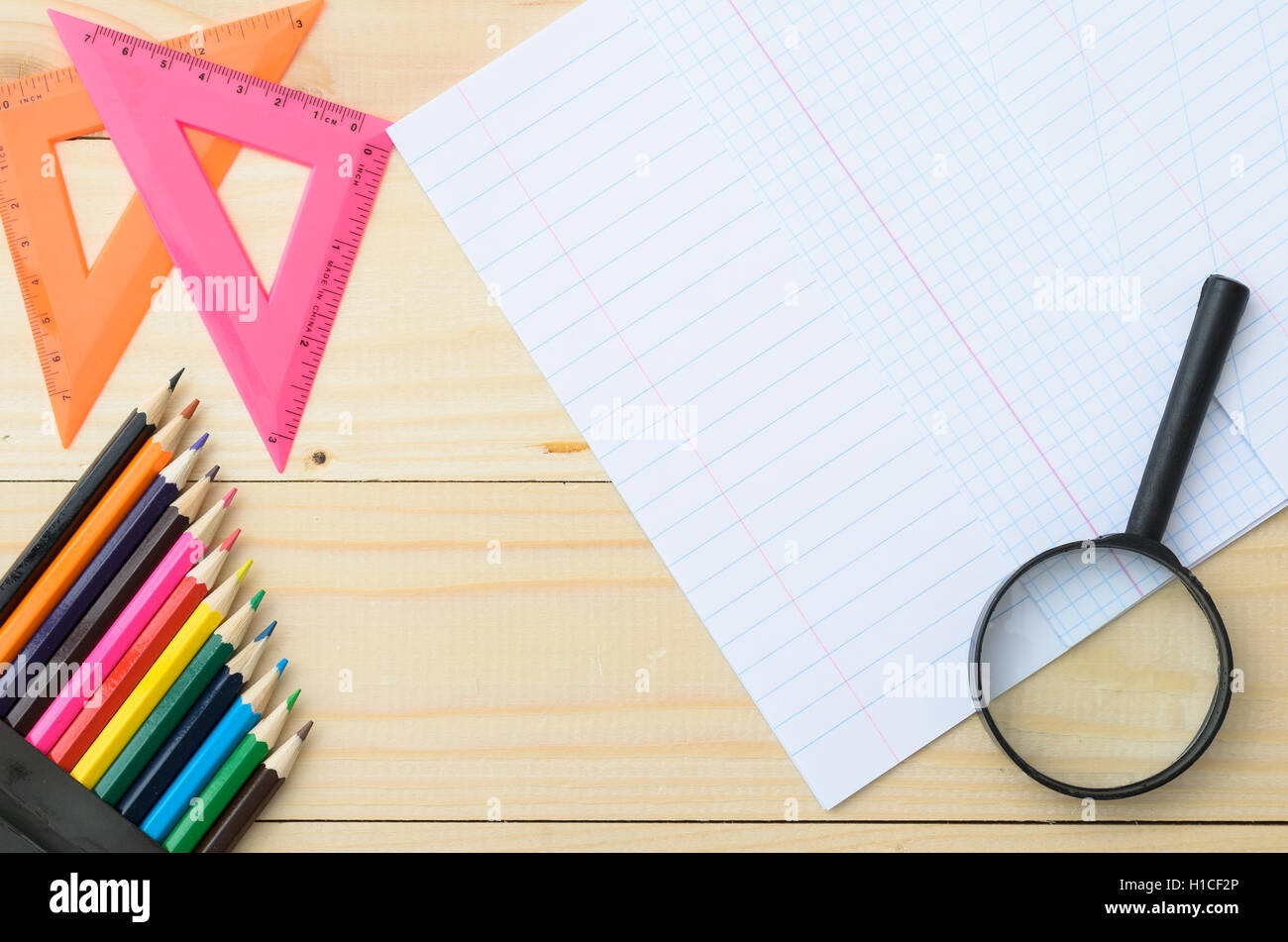 Colored pencils and paper Stock Photo Alamy