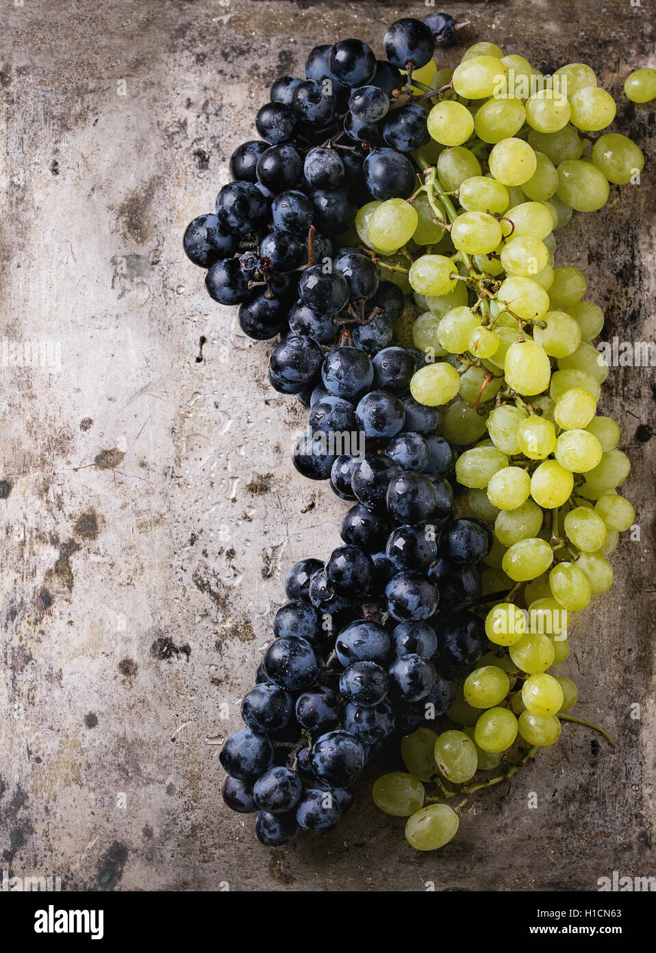 Bunches of red and white grapes Stock Photo