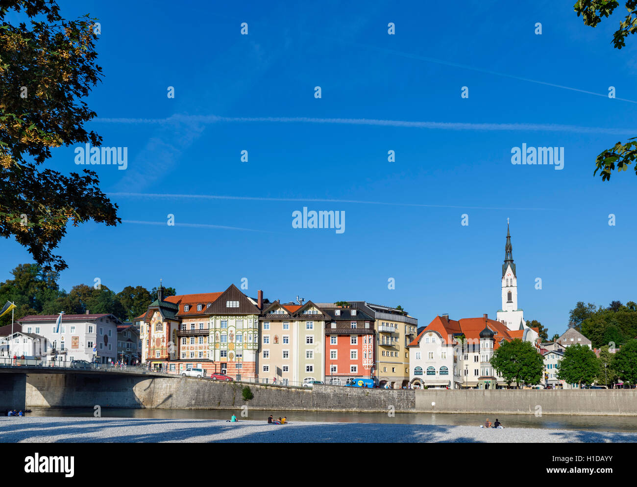 View towards the historic old town from the River Iser in the late afternoon, Bad Tölz, Bavaria, Germany Stock Photo