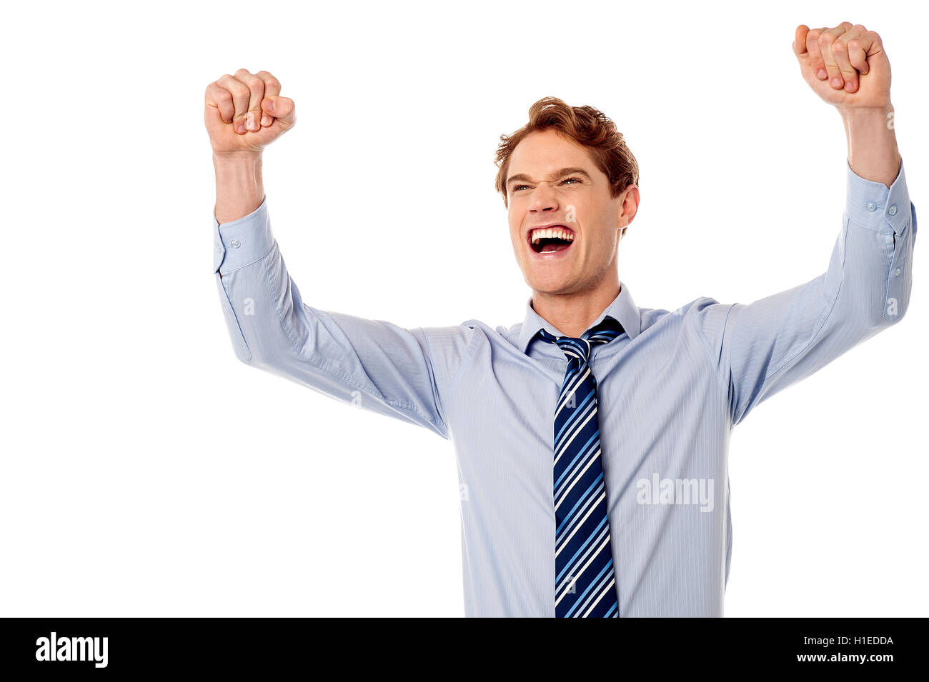 Excited young male executive Stock Photo - Alamy