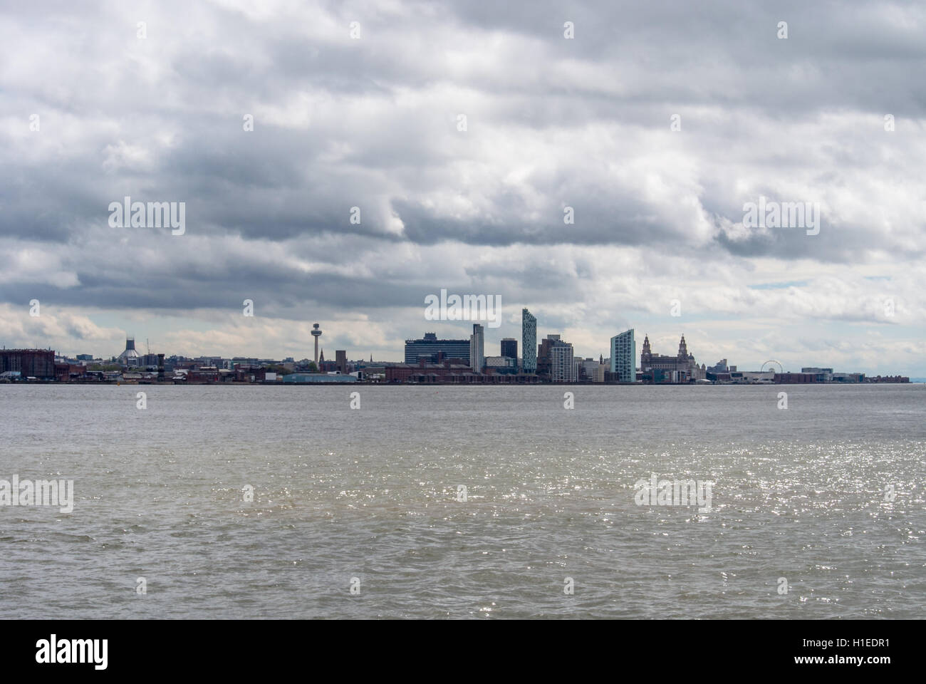 Liverpool skyline viewed from New Brighton on a cloudy day Stock Photo