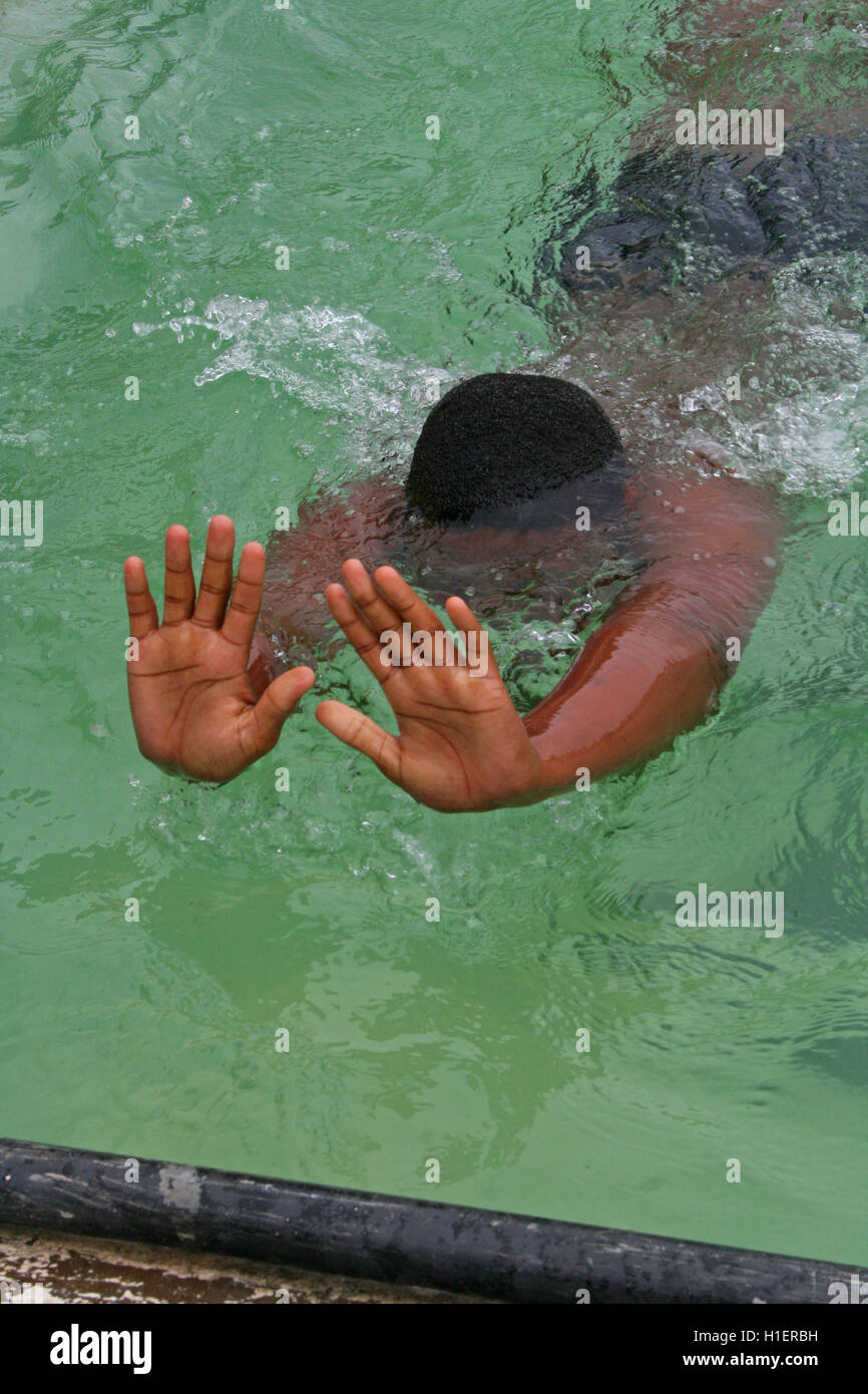 School boy swimming, open turn, St Mark's School, Mbabane, Hhohho