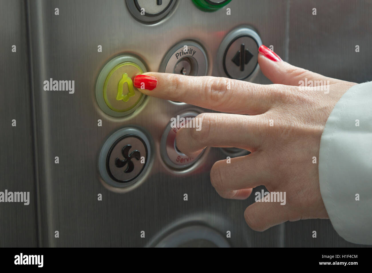 Alarm button in elevator Stock Photo