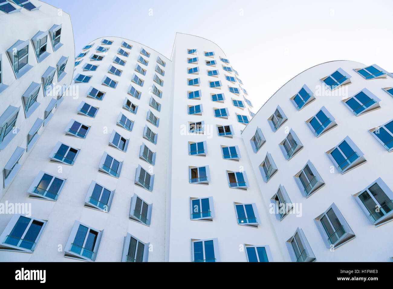 white house with blue windows, modern architecture Stock Photo - Alamy
