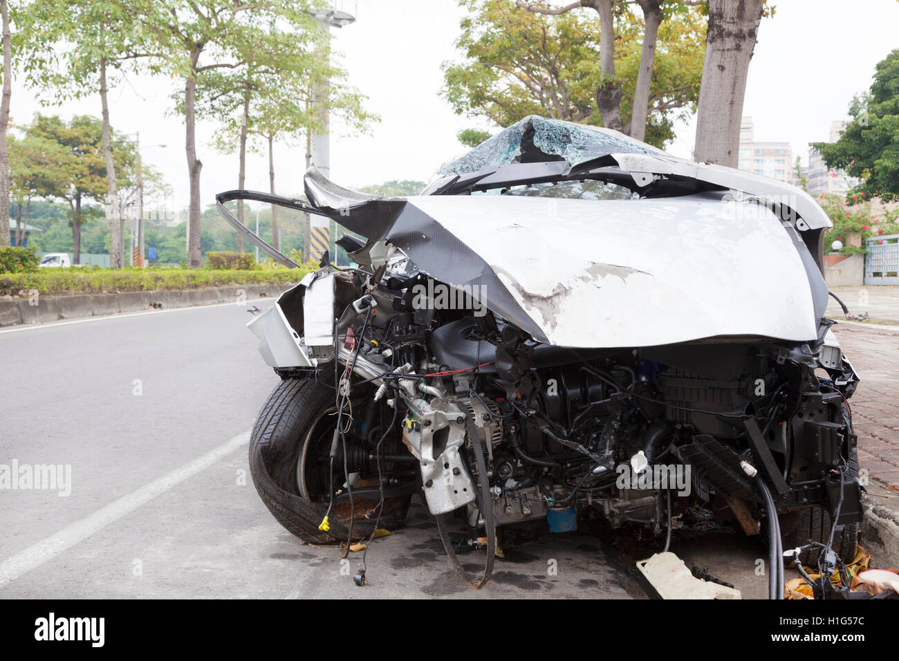 wrecked car on the road Stock Photo Alamy