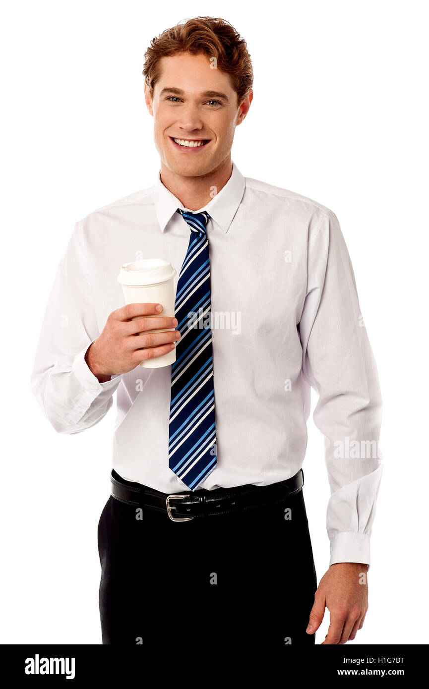 Corporate man holding cold beverage Stock Photo - Alamy