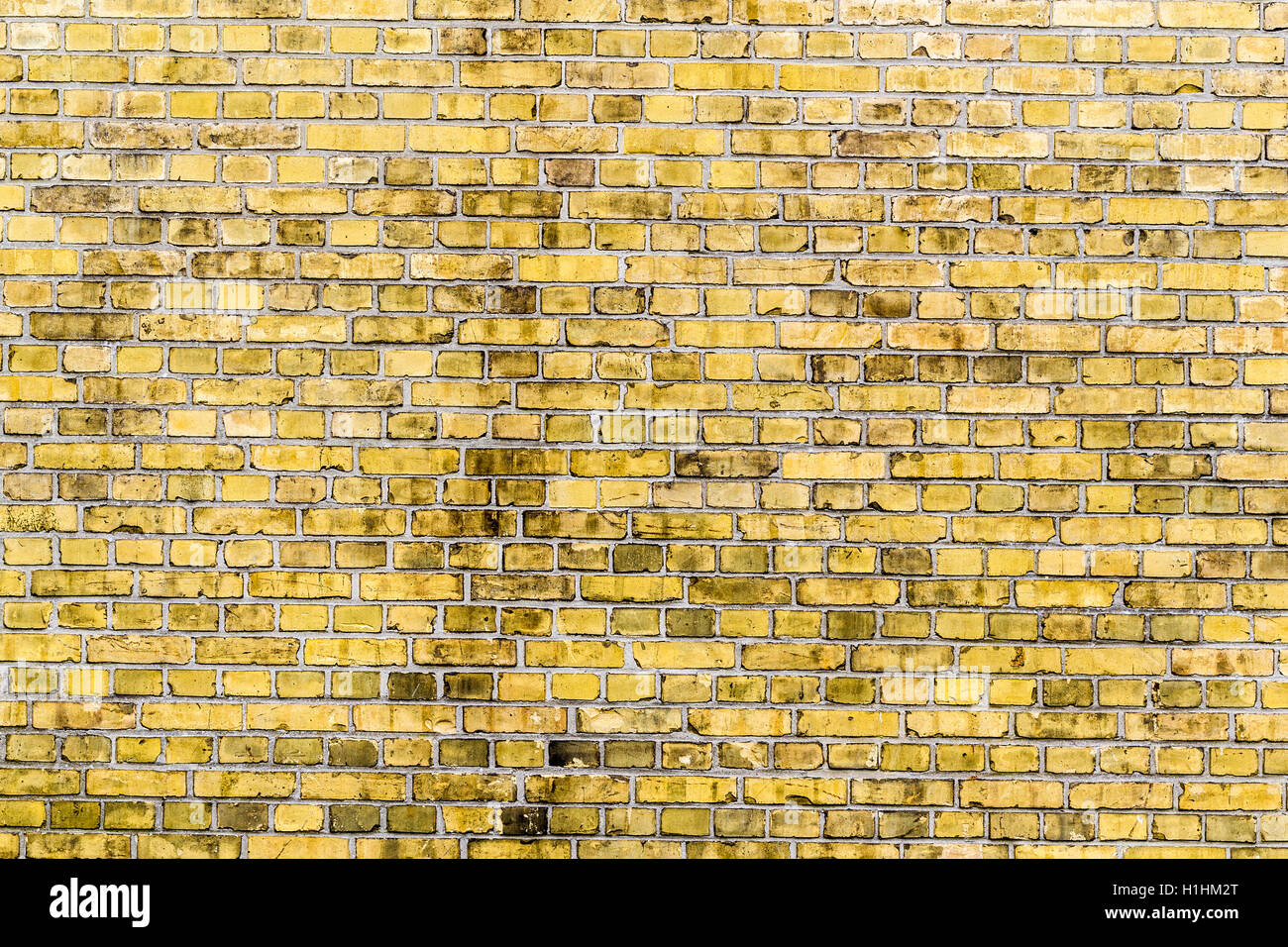 vintage yellow brick wall background Stock Photo - Alamy
