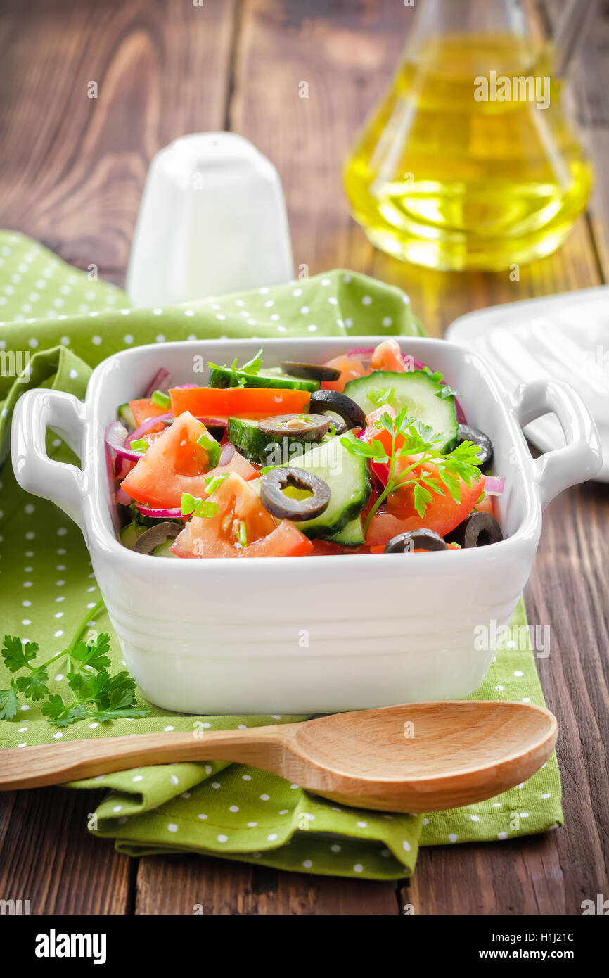 Salad with tomatoes and cucumbers Stock Photo - Alamy